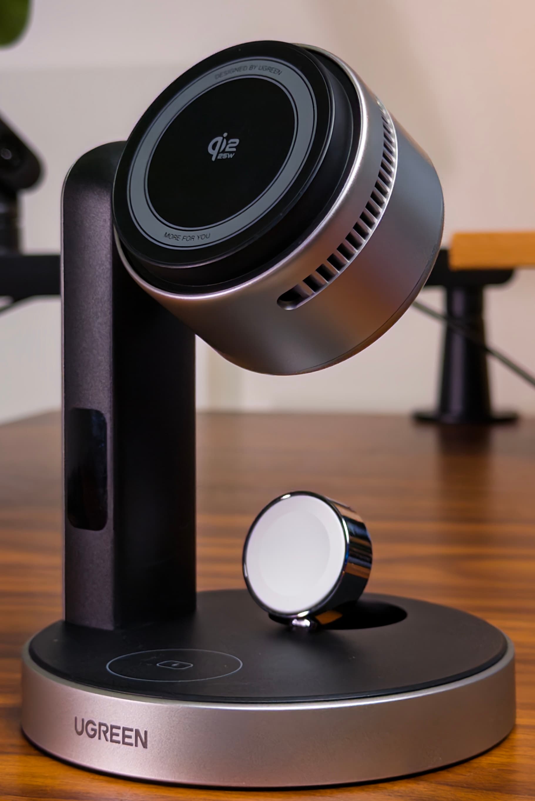 Front view of the UGREEN MagFlow Pro with its tilted Qi2 charging head, watch charger and charging base